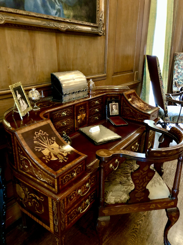 A wood desk and chair with inlay at Cheekwood Estate Nashville TN