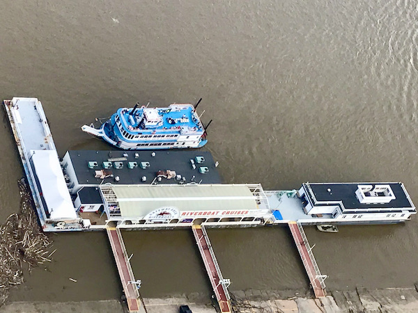 Looking down at the muddy river and paddleboat from the top of the Gateway Arch Saint Louis MO