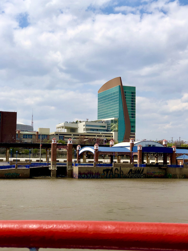 A downtown area viewed from a paddleboat on the Mississippi river.