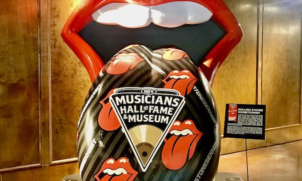 A bright red mouth with long tongue hanging out in tribute to the Rolling Stones.