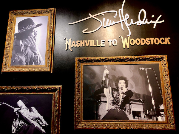 A wall of photos of Jimi Hendrix at the Musicians Hall of Fame Nashville