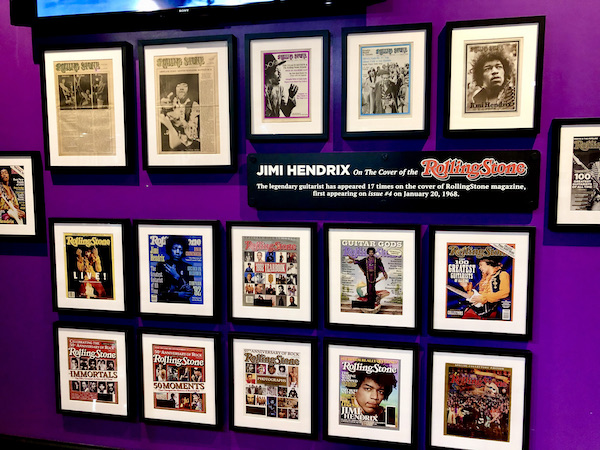 A wall of framed Roliing Stone Magazine covers featuring Jimi Hendrix