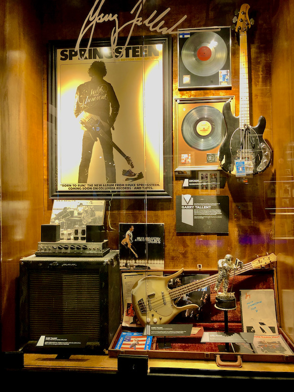 A wall of photos and records paying tribute to Bruce Springsteen