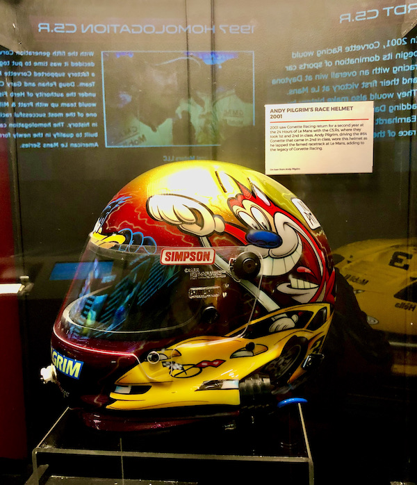 A brightly painted car race helmut on display at the National Corvette Museum