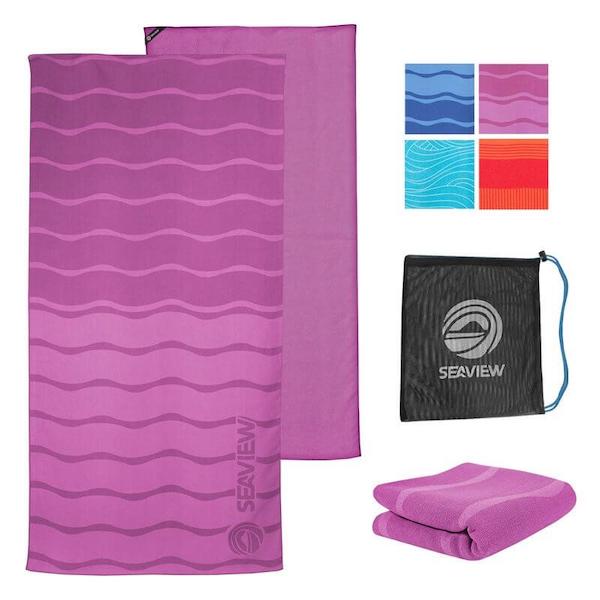 A hot pink beach towel with four colors available from Fabulous Gifts for Campers