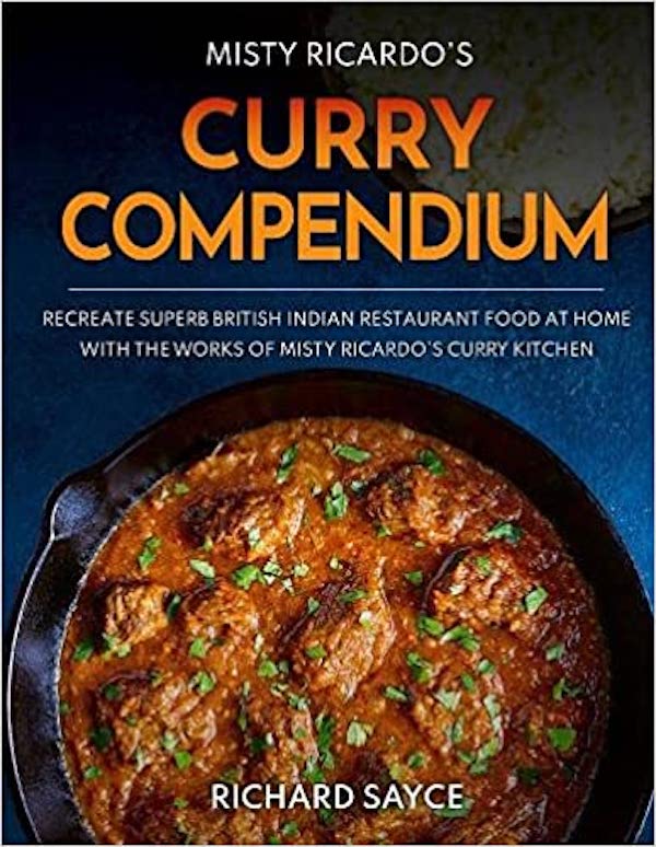 A dark blue cover with a black pan of curry on this book cover from Fabulous Gifts for Campers