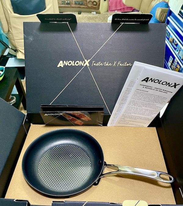 A non stick sauté pan in a box with white pamphlet of insttuctions from Fabulous Gifts for Campers