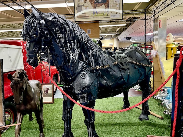 Black metal horse sculptures at Tallahassee Automobile Museum