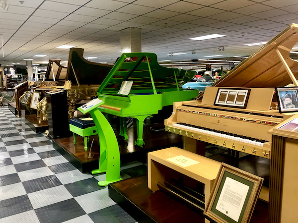 A collection of pianos at the Tallahassee Automobile Museum