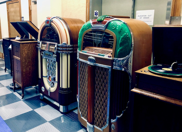 A row of antique juke boxes.