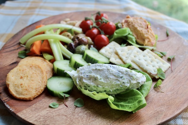 A platter of lettuce, red grapes, cucumber slices and benedictine from Just a Few Miles South