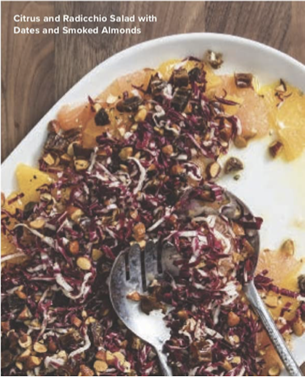 An oval platter topped with radicchio, dates and nuts from The Complete Autumn and Winter Cookbook