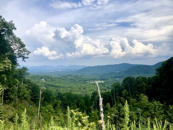 Green mountains, valleys and puffy clouds at Art Mecca Asheville North Carolina