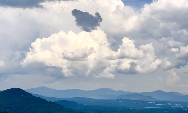 Lots of layers of mountains, gray sky and lots of clouds at Art Mecca Asheville North Carolina