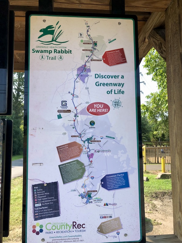 A sign showing the route of the Swamp Rabbit Trail greenway in Beautiful Greenville South Carolina
