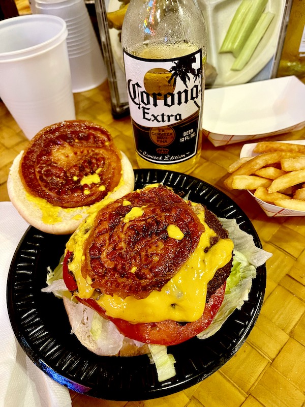 Hamburger Joe's North Myrtle Beach SC bacon cheeseburger with tomato and lettuce, fries and a beer.