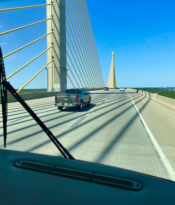 Seen through the RV windshield is a suspension bridge over water on Our Pilgrimage to the Jersey Shore