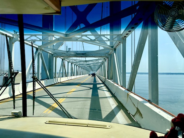 Looking through the windshield of an RV crossing a bridge.