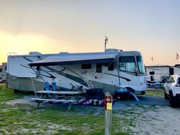 Our RV with slides and awning out while Revisiting Delaware Seashore State Park