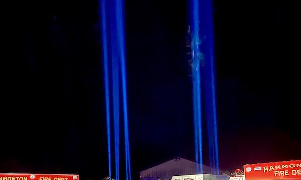 Two fire trucks and two beacons of blue light.