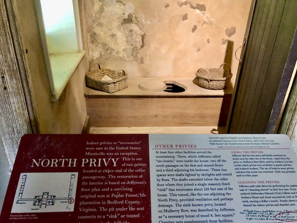 A low bench with a cut out for using as a toilet at Thomas Jefferson's Monticello