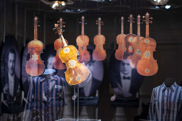 A picture of several violins from Aboard Titanic Pigeon Forge TN
