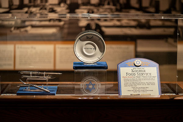 A display case with artifacts of the Kosher Kitchen Aboard Titanic Pigeon Forge TN