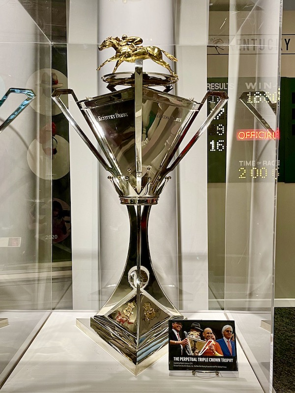 A silver trophy in a display case is the Kentucky Derby trooper on display at Churchill Downs Louisville Kentucky