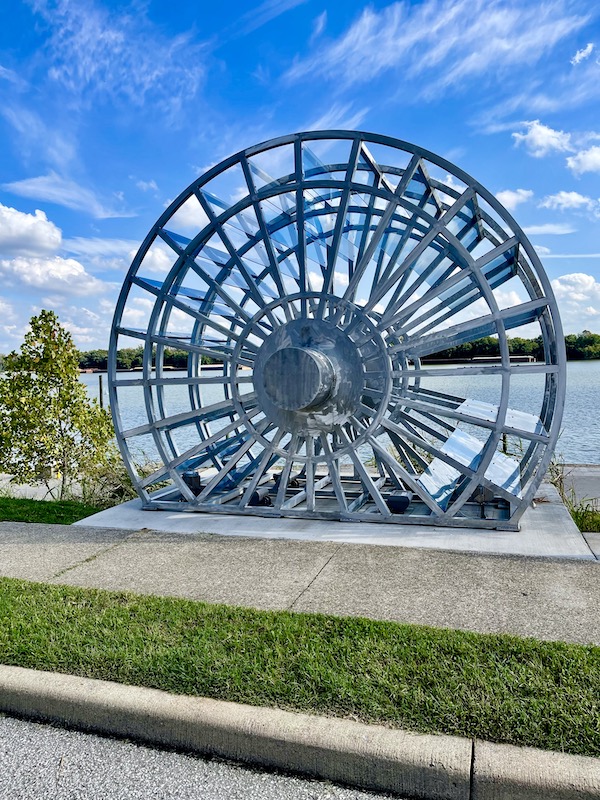 A sculpture of a paddle wheel at the riverfront park in Jeffersonville Indiana.