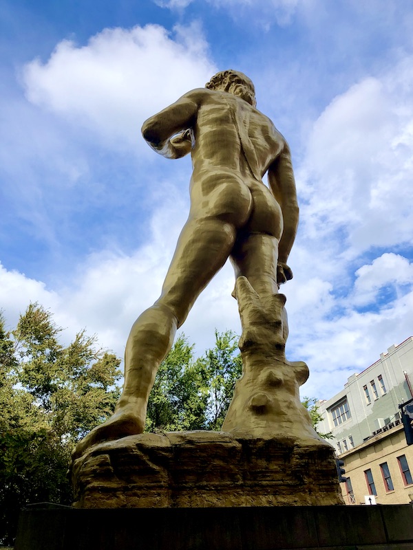 The rear view of a statue of David in Downtown Louisville Kentucky