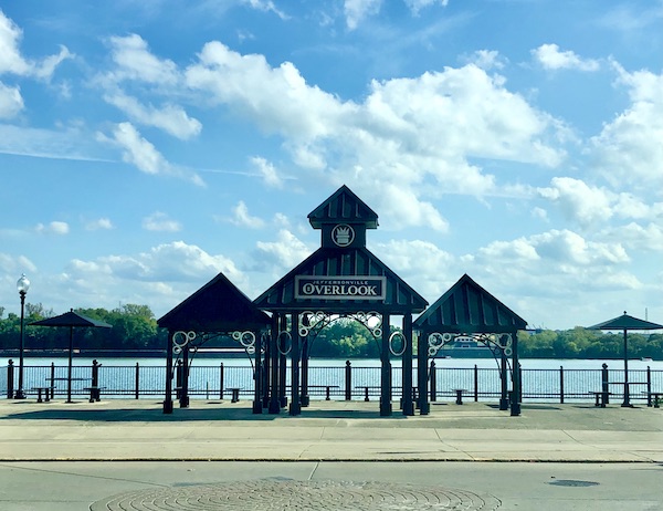 A series of pavilions along a river.