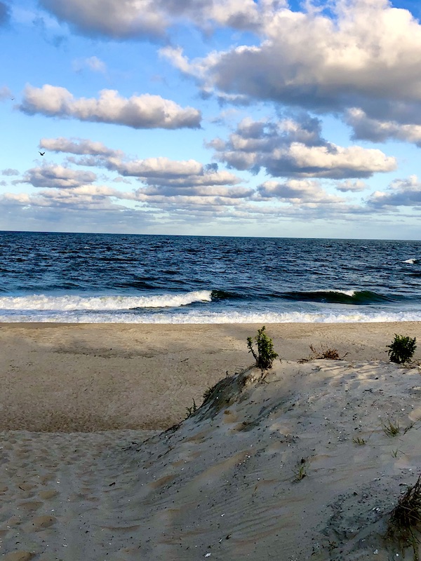 Beach, ocean and beautiful sky at the Delaware seashore.