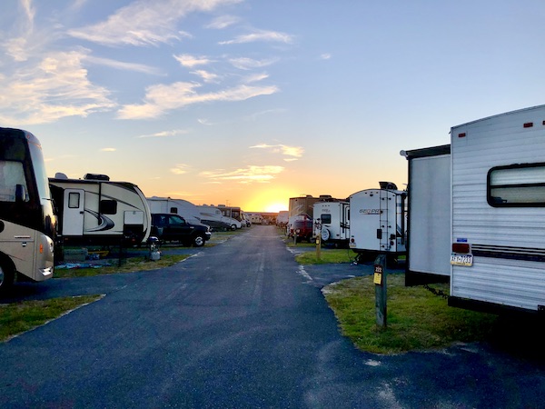 Sunset at an RV park at dusk.