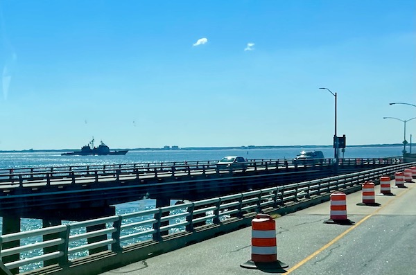 A battleship in the bay and highway across the Chesapeake.