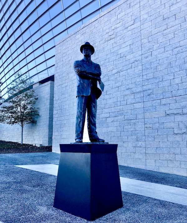 A bronze sculpture of Dallas Cowboy's Head Coach. This is just outside of the main entry to Dallas Cowboys Stadium Tour