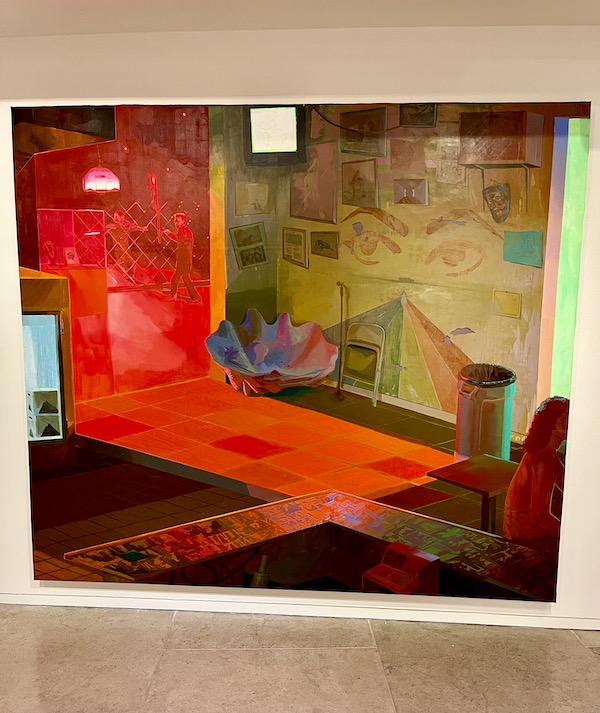 A painting of a room in reds and yellow at AcA in Downtown Lafayette Louisiana