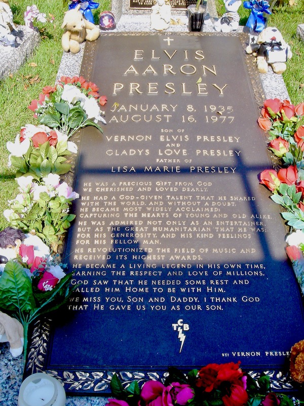 A black grave marker for Elvis Presley at Graceland Home of the King