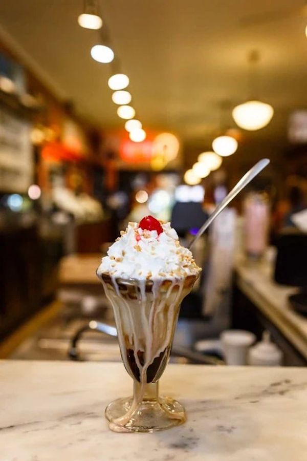 A chocolate Hot Fudge Sundae with whipped cream and a cherry from Wonderful Galveston Island Texas