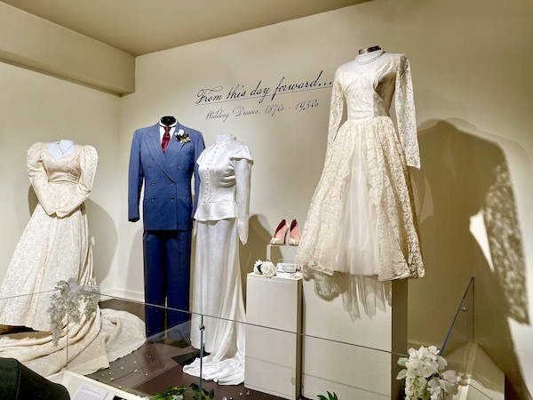 Vintage wedding gowns and a blue suit for the groom in Abilene TX.