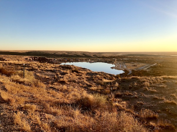 A rocky surface with a tiny lake at Bottomless Lakes State Park Roswell NM
