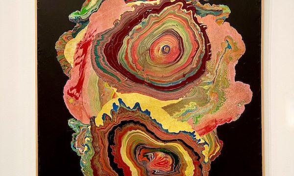 Swirls of colors on a black background at the Dallas Museum of Art