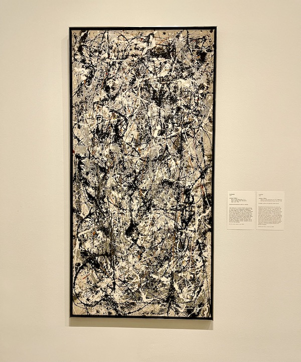 Black, beige, gray and white drip painting by Jackson Pollock