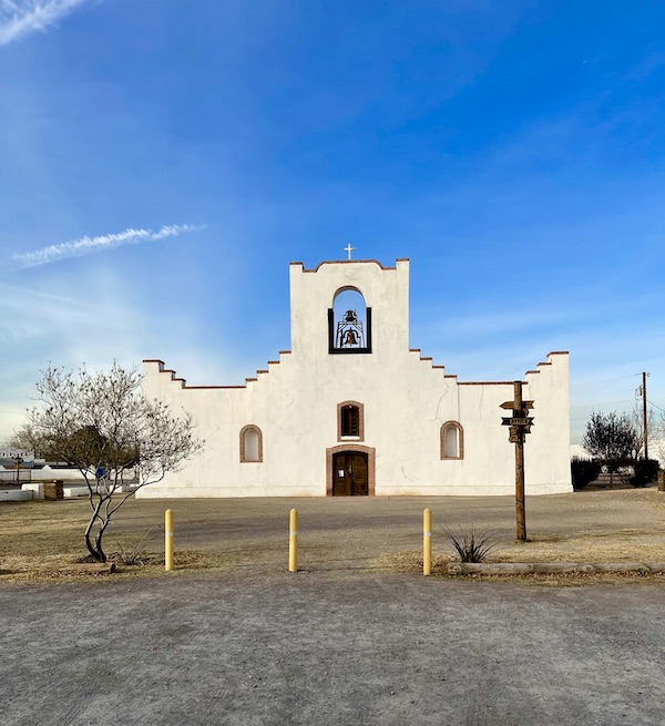 A Spanish style white church along the El Paso Texas Mission Trail