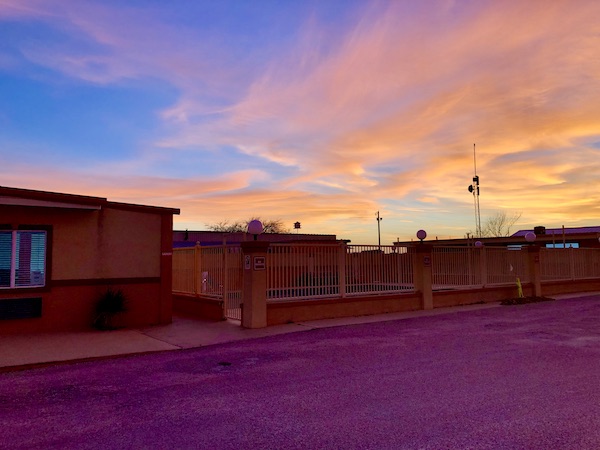 A blue, orange, yellow and pink sky after a Fun Day at Abilene Zoo