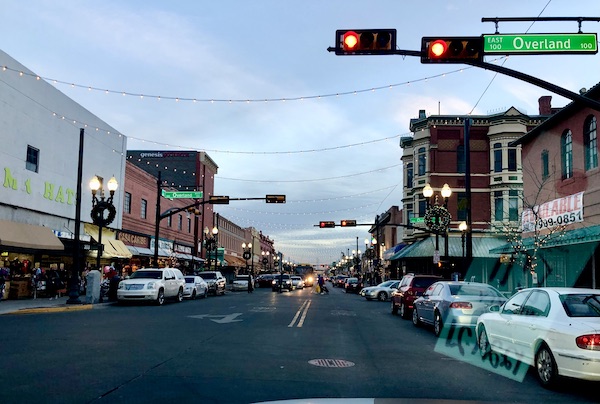 A street with shops on both sides of the street.