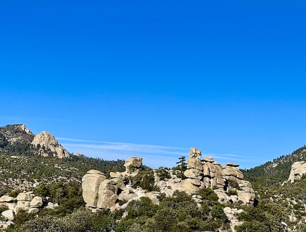 White rock formations that look like a family standing in a circle.