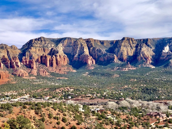 Red Rocks of Sedona Arizona with vegetation in the foreground.