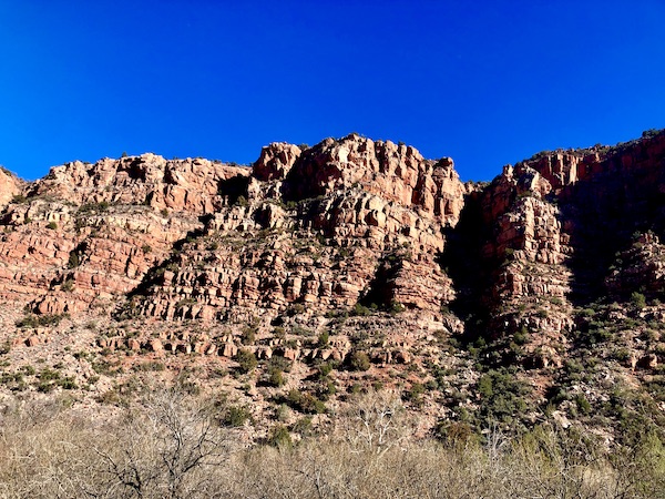 Stone mountains, deep clear blue sky and brush along our Verde Canyon Railroad Wilderness Route