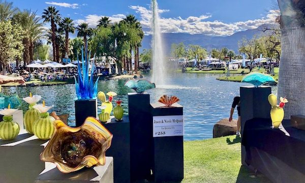 Pedestals displaying assorted glass sculptures at La Quinta Art Celebration California