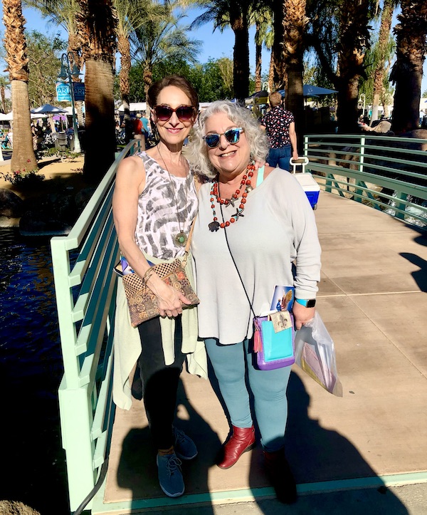 A woman with short dark hair and a woman with silver hair at the La Quinta Art Celebration California
